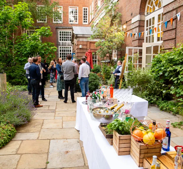 an outdoor summer party setting with a food platter